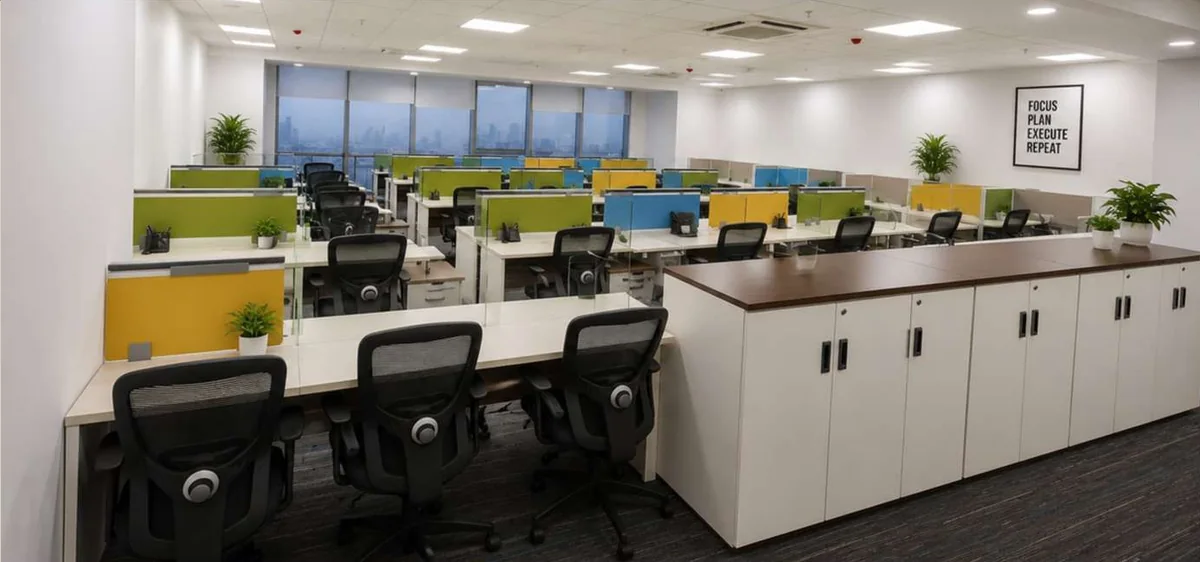 Open office with green and yellow workstation dividers, storage and daylight